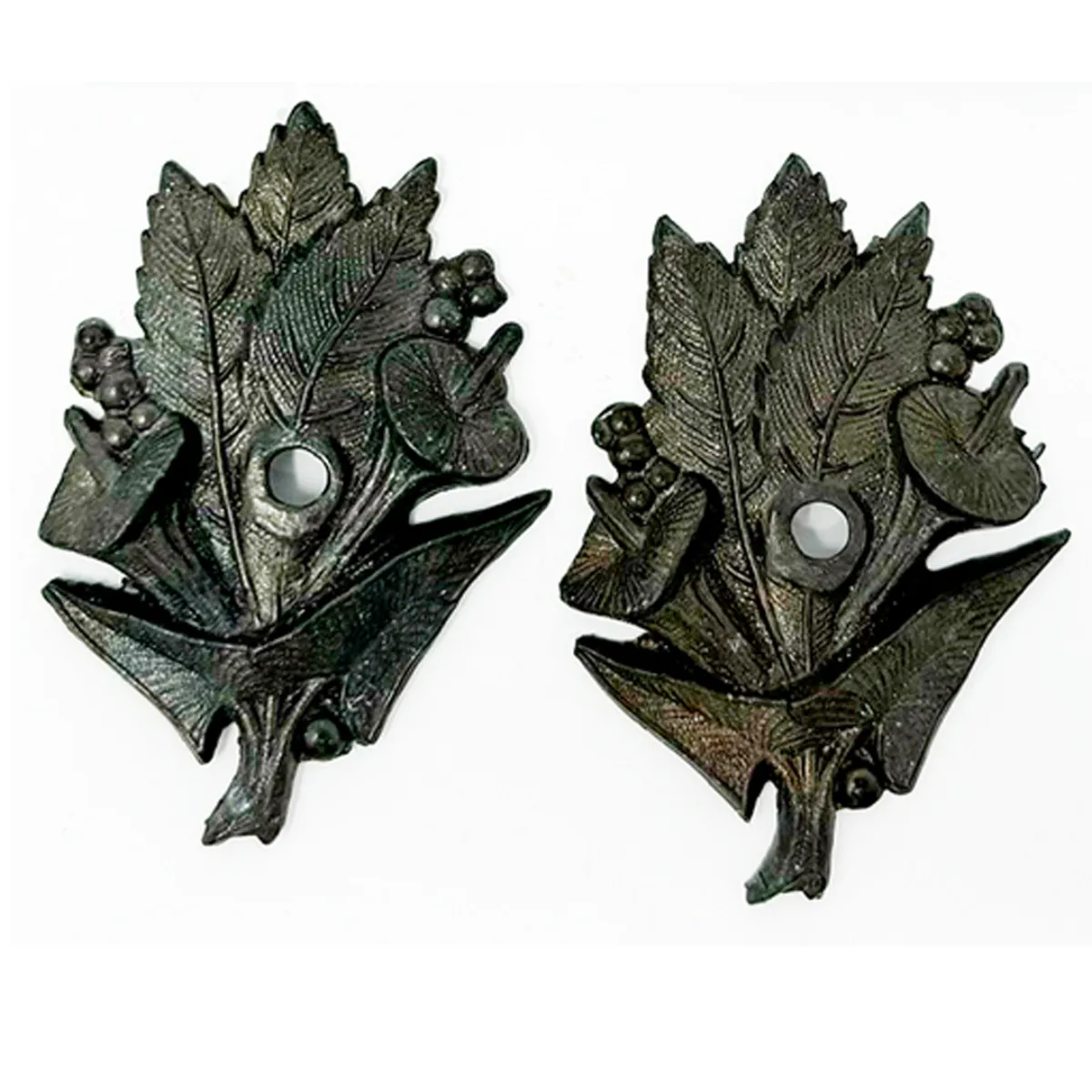 Pair of Decorative Lilly Figural Casket Adornments